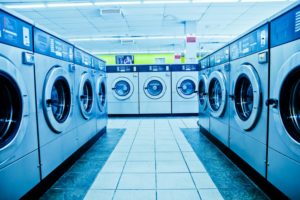 Pro Laundry Break - Genesis Canada Heavy duty liquid alkali booster for commercial and industrial laundry.