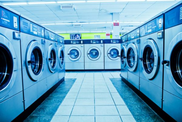 Pro Laundry Break - Genesis Canada Heavy duty liquid alkali booster for commercial and industrial laundry.