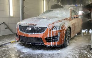 Orange Crush Professional Car Wash Pre-Treatment and universal high foaming detergent in car wash.