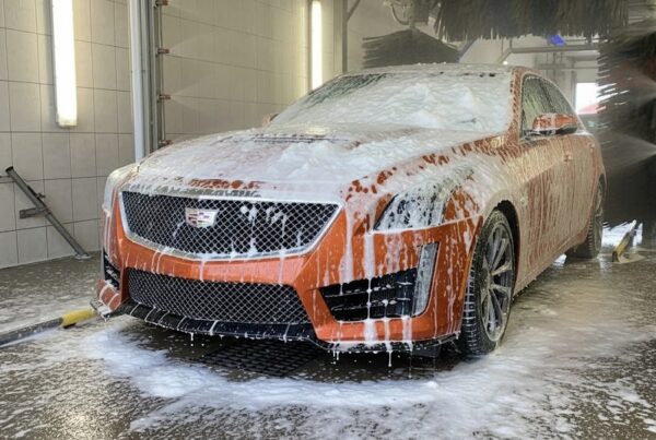 Orange Crush Professional Car Wash High Foaming Car & Truck Wash Detergent in car wash.